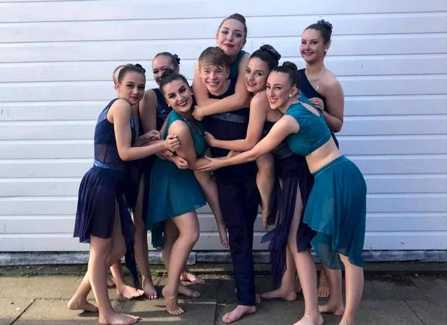 Libby with JL Dance friends outside in costume
