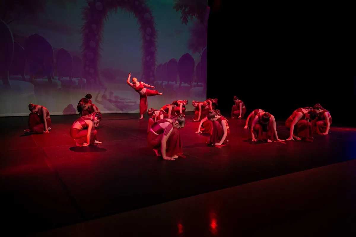 Lyrical dancers performing as a group on stage with JL Dance Academy in Ripley